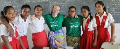 Projects Abroad volunteers pose with students during their volunteer teaching in Samoa. Students pose with school children during their volunteer teaching in Samoa.